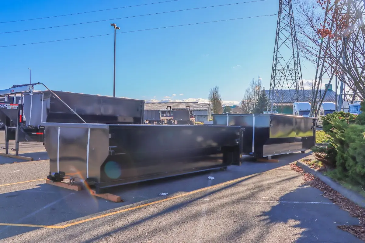 Roll-off dumpster ready for waste disposal at job site for 3 Yard Dumpster Rental in Sweetwater